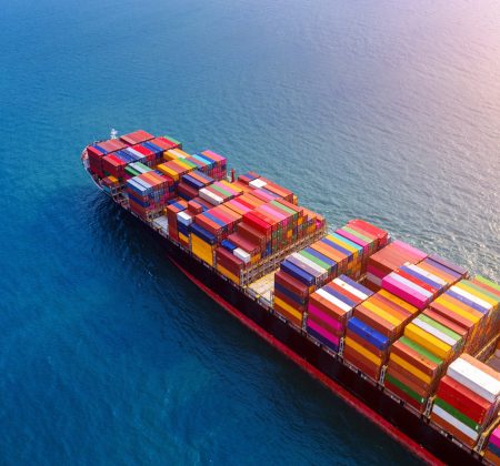 aerial-view-of-container-cargo-ship-in-sea-scaled.jpg